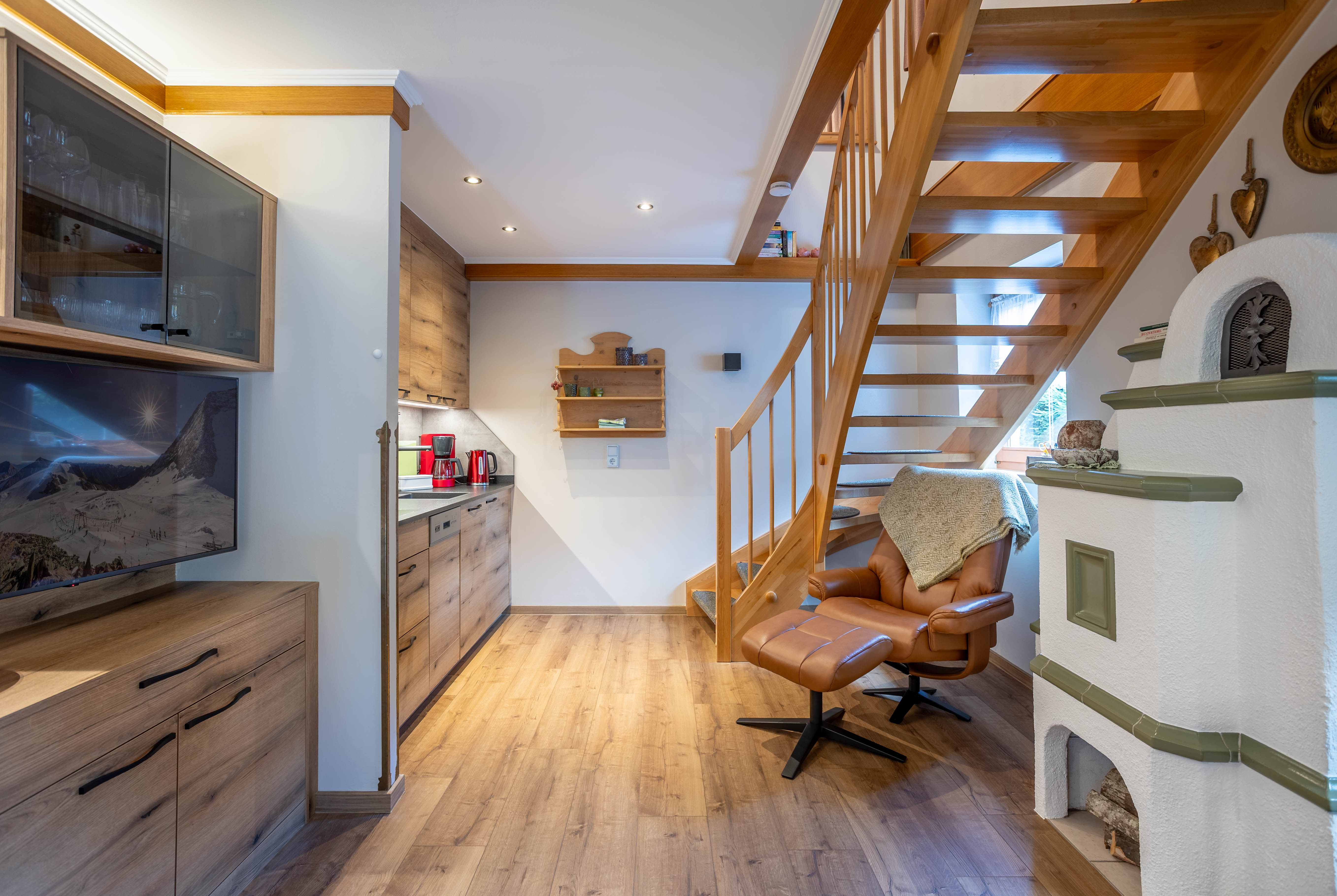 Ferienwohnung Gredler – Wohnküche mit Kachelofen